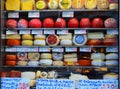 Porto, Portugal - abundance of Portuguese cheeses in a shop window in the city center