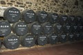 Porto, Portugal, August 21,2018: the Number of barrels of port wine in the cellars of Calema. Visible on the barrels of aging wine Royalty Free Stock Photo