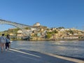 PORTO, PORTUGAL - CIRCA APRIL 2023: View of Ribeira Square and Dom Luis I Bridge in Porto, Portugal Royalty Free Stock Photo