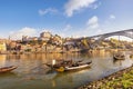 Porto Portugal city skyline at Ribeira and Douro River with Rabelo wine boat Royalty Free Stock Photo