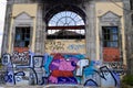 Porto, Portugal, 1.04.2017. Colorful graffiti on crumbling Art Deco facade close to Sao Bento railway station.