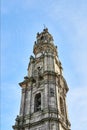 Porto, Portugal -10 December, 2018: Bell tower of the Clerigos Church Torre dos Clerigos in blue sky background, is one famous