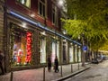 Porto, Portugal - December 9, 2023. Night scene of showcase of the famous Marques Soares store in Porto with Christmas decorations