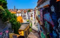 Traditional narrow street and historical houses in the City of Porto on a sunny day