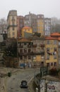 Vertical shot of old residential buildings and streets of Porto in Portugal