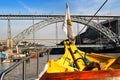 Typical portuguese boats called Rabelos crossing the Douro River