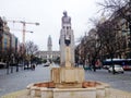 Sculpture of a smiling woman in Porto, Portugal