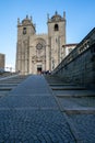 Porto Se Cathedral Church as seen from the cobblestone walkway path on a sunny winter day