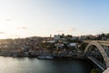 Porto, Portugal - July, 2017. Aerial view of Dom Luis I on Douro River at sunset at Vila Nova de Gaia, Porto, Portugal. Picturesqu