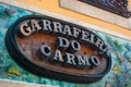 Porto, Portugal - June 6, 2021: Liquor store Sign Bottle Cellar of Carmo Text beautiful design