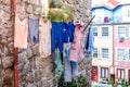 Porto, PORTUGAL - 07/11/2020: laundry hanging in streets of the old town of Porto city