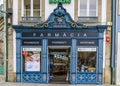 Ornate facade of an old 19th century pharmacy in a traditional Portuguese house in Porto, Portugal