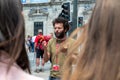 Tour guide at the Old Sao Bento Train Station in the city of Porto in the summer of 2022 Royalty Free Stock Photo