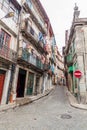 PORTO, PORTUGAL - OCTOBER 17, 2017: Narrow steep street in Porto, Portug