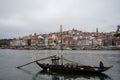 Porto, Portugal, October 31,2020. View from Vila Nova de Gaia on port makers boats and colorful old houses on hill in old part of