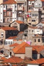 Porto Portugal with old ancient buildings, orange roofs and gray walls A vertical photo Royalty Free Stock Photo