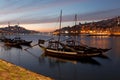 PORTO, PORTUGAL - 07.10.2016, old town cityscape on the Douro River with traditional Rabelo boats, with barrels advertising Porto