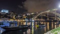 Porto, Portugal old town skyline on the Douro River with rabelo boats timelapse . Royalty Free Stock Photo