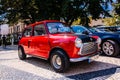 Red car Mini Cooper on the square near Porto City Hall, Portugal 24.08.2019 Royalty Free Stock Photo