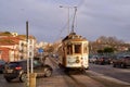 Porto, Portugal. Traditional vintage tram passes through the historical Linha 1 tram line