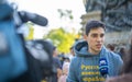 PORTO, PORTUGAL - 17.04.2022: A young Ukrainian male activist gives an interview to Portuguese television
