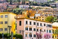 Porto Santo Stefano, Monte Argentario, Tuscany, Italy, beautiful buildings, city generic architecture on mountain Royalty Free Stock Photo