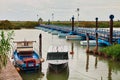 Porto Tolle, Veneto, Italy: the floating bridge over the river i Royalty Free Stock Photo