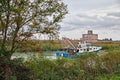 Porto Tolle, Veneto, Italy: view of the Po Delta Park with a fishing boat in the river Royalty Free Stock Photo