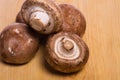 Portobella mushrooms on a cutting board Royalty Free Stock Photo