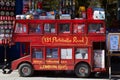 Portobello road souvenir shop with red London bus Royalty Free Stock Photo