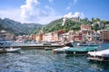 Portofino, Liguria, Italy: 09 aug 2018. Best touristic Mediterranean place with colorful houses, fishing boats and luxury yacht. Royalty Free Stock Photo