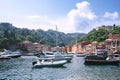 Portofino, Liguria, Italy: 09 aug 2018. Best touristic Mediterranean place with colorful houses, fishing boats and luxury yacht.