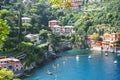 Portofino, Genova province, Liguria, Italy: 09 aug 2018.Portofino landscape, view to boats on water, colorful houses and villas