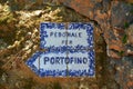 PORTOFINO, ITALY - JUNE 13, 2017: ceramic sign Pedonale per Portofino, the walking trail on the cliff from Paraggi to Portofino