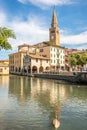 View at the Church of Saint Andrew with Lemene river in Portogruaro - Italy