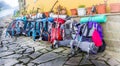 Portomarin, Spain - Pilgrim Backpacks and other Hiking Gear outside a Cafe on the Way of St James Camino de Santiago