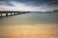 Portoroz, Slovenia - May 26, 2019 - people relaxing on wooden footbridge pier in Portoroz on adriatic coastline Royalty Free Stock Photo