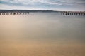 PortoroÃâ¦ÃÂ¾, Slovenia - May 26, 2019 - people relaxing on wooden footbridge pier in PortoroÃâ¦ÃÂ¾ on adriatic coastline Royalty Free Stock Photo