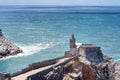 Portovenere view of the canall and Saint Peter's church Royalty Free Stock Photo