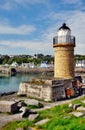 Portpatrick lighthouse and harbour Royalty Free Stock Photo