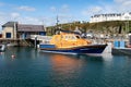 Orange Lifeboat in Portpatrick Royalty Free Stock Photo