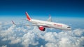 portrait from above of an Air India plane with a background of clouds Royalty Free Stock Photo
