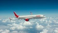 portrait from above of an Air India plane with a background of clouds Royalty Free Stock Photo