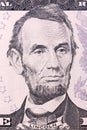 Portrait of Abraham Lincoln on five U.S. dollar bill. Royalty Free Stock Photo