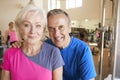 Portrait Of Active Senior Couple Exercising In Gym Together Royalty Free Stock Photo