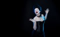 Portrait of the actress brunette woman with high hair, a black collar with roses on a neck and in a corset in old style Royalty Free Stock Photo