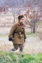 Portrait of actress dressed as Russian Soviet soldier of World War II in military-historical reconstruction in Volgograd. Royalty Free Stock Photo