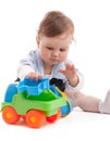 Portrait of adorable baby boy playing with toys