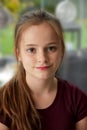 Cheerful teenager girl with freckles