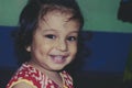 Portrait Of Adorable Cute Indian happy funny baby with dimples age one year six months smiling and Posing looking at camera. Happy Royalty Free Stock Photo